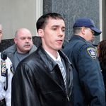 New York City Police officer Richard Kern, front center, exits Brooklyn State Supreme Court following his arraignment, Tuesday, Dec. 9, 2008, in New York. Kern was charged with hindering prosecution and official misconduct for allegedly covering up an attack on a tattoo parlor worker in a subway station.